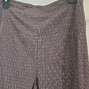 Michael Kors Patterned leggins with Monogram Design. Size M